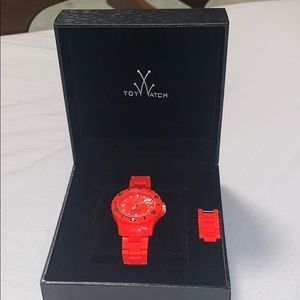 Toy neon orange watch